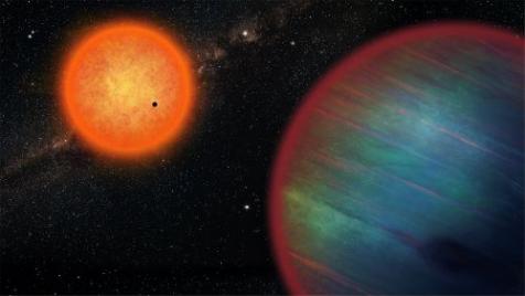 An artist’s impression of the two new planets discovered. An inner super-Earth, here seen transiting in front of the orange host-star and an icy giant planet on the periphery of t