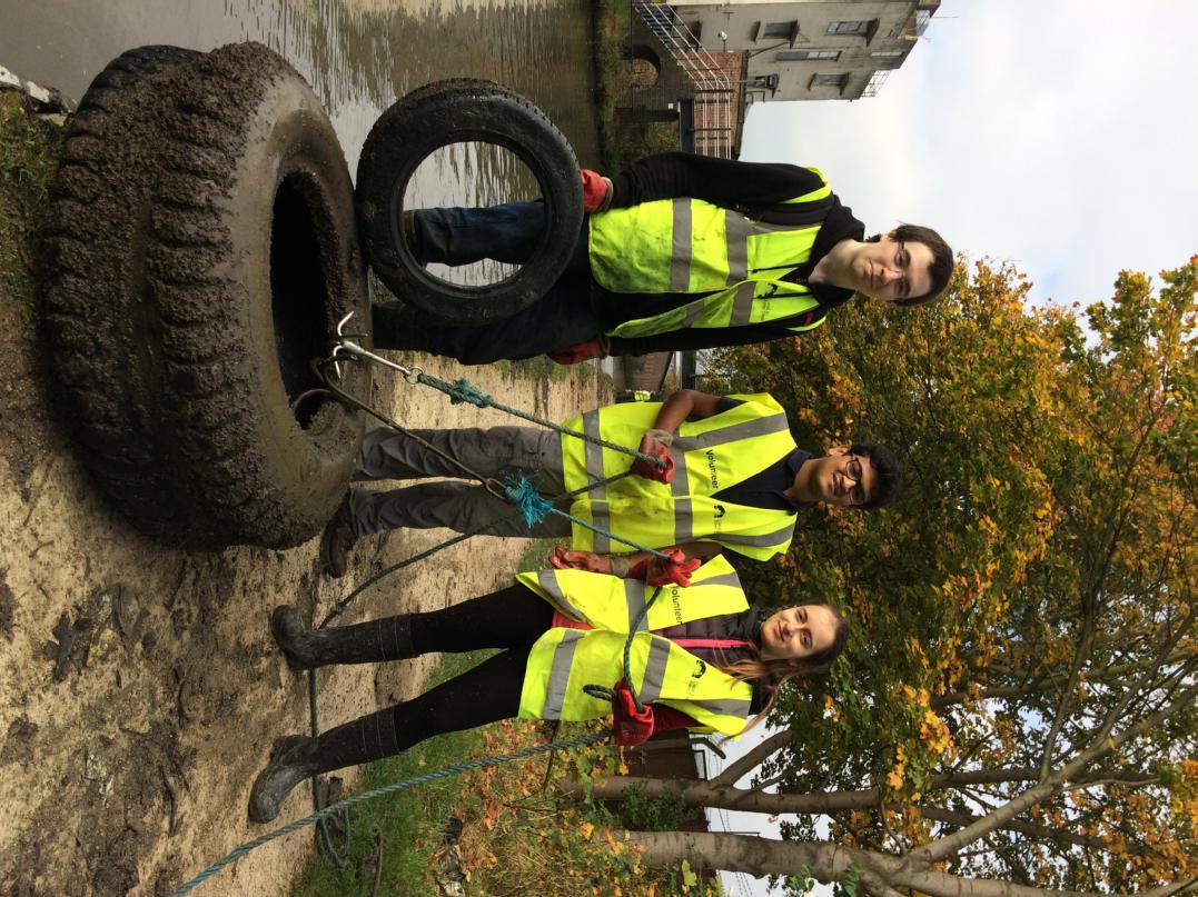 Volunteers and tyre