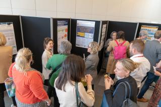 Delegates in the research culture poster area of the event