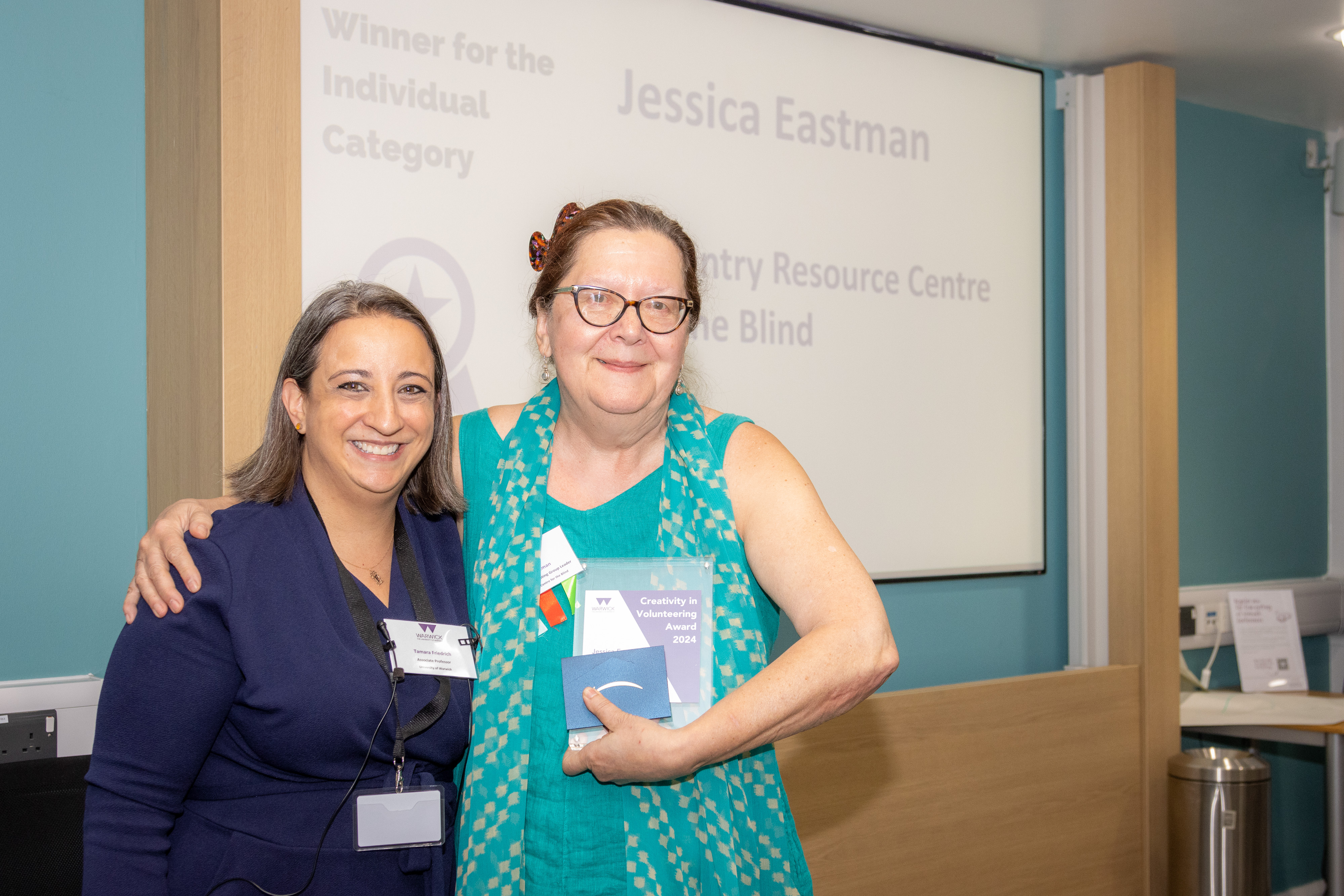 Photo of Jessica Eastman receiving her creativity in volunteering award in the Individual Category 