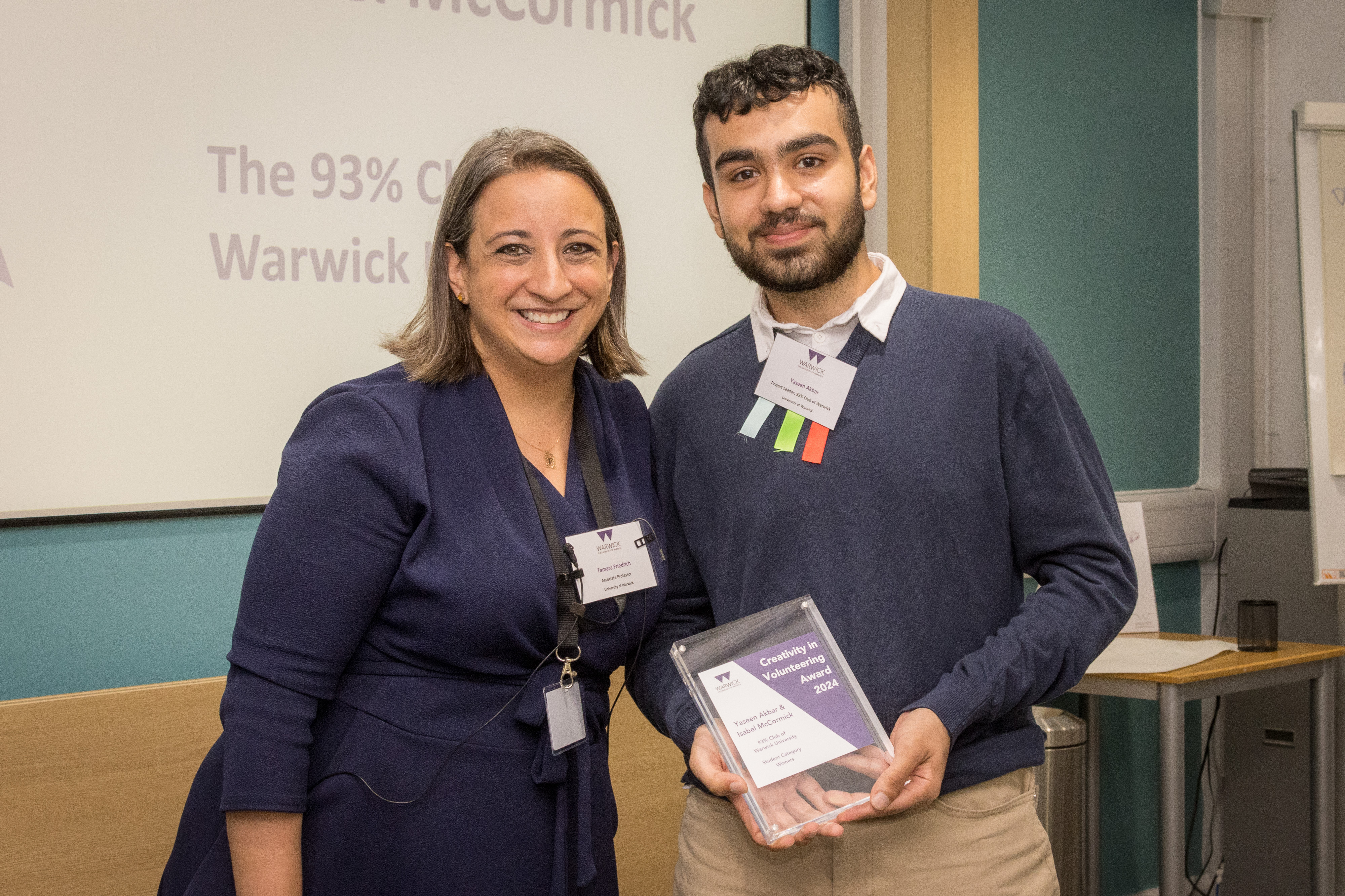 Yaseer Akbar receiving his creativity in volunteering award in the student category. Fellow winner, Isabel McCormick is not pictured. 