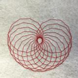 Red stitching on a white felt background. The red stitching makes several overlapping eleven-sided shapes. 