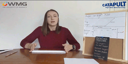 A GIF showing Rebecca building a bridge out of paper