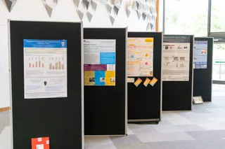 Research culture posters from a variety of UK universities on display at the event