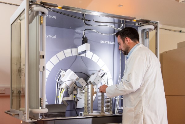 A technician working at a piece of equipment