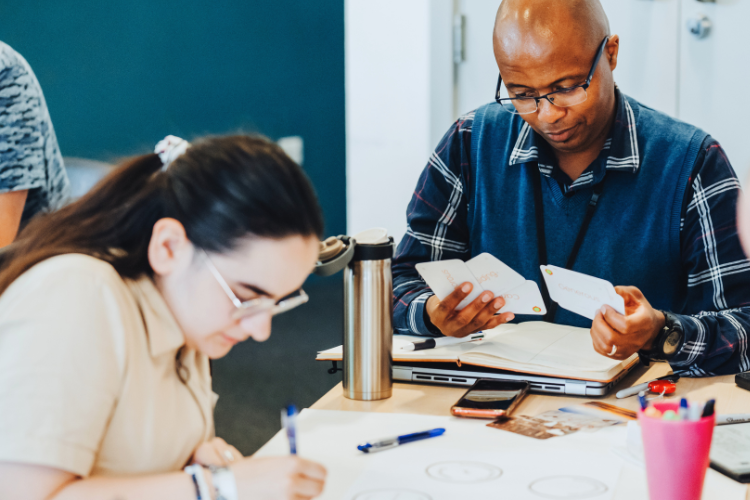 People focusing on their work at a workshop