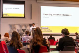 Dr Arun Advani (Department of Economics) introducing his talk on Inequality, Wealth & Tax