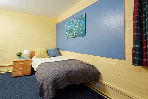 Whitefields bedroom Bedroom with bed and bedside cabinet