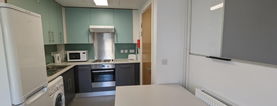 an image of a kitchen and dining area in a self contained flat on campus