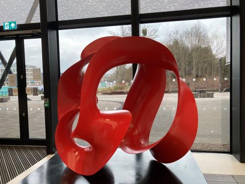 Red ribbon like sculpture