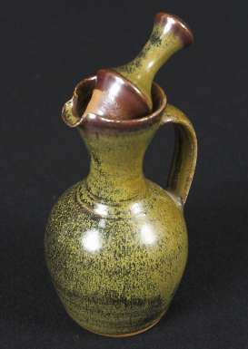Oil bottle with stopper by Winchcombe Pottery