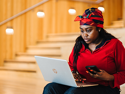 A student using a laptop