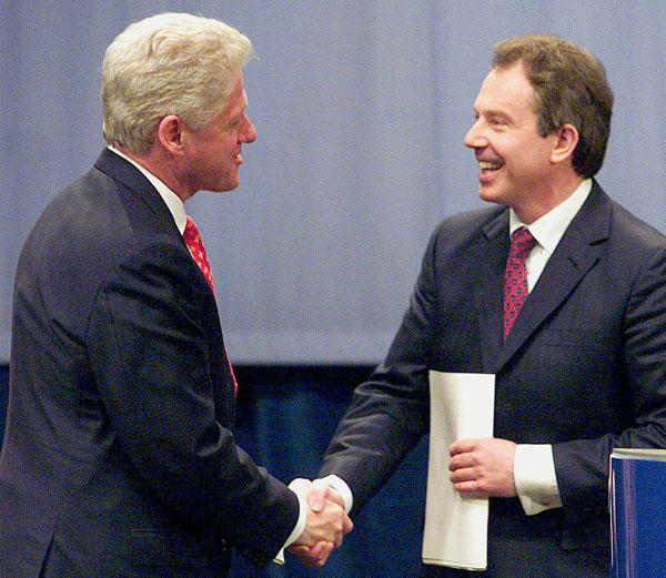 Prime Minister Tony Blair and President Bill Clinton shaking hands