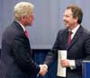Tony Blair and Bill Clinton shaking hands