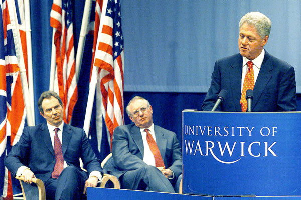 Vice Chancellor Brian Follett and Prime Minister Blair listening to President Bill Clinton.