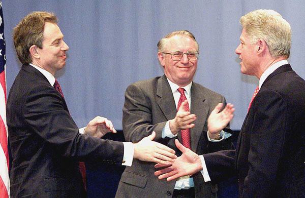 Prime Minister Blair and Vice Chancellor Follett applauding President Bill Clinton.
