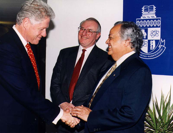 President Bill Clinton is introduced to Chancellor Sir Shridath Ramphal by the Vice Chancellor, Sir Brian Follett.