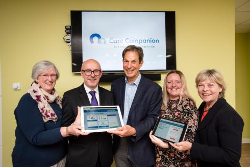 The University of Warwick's launch of Care Companion, an online platform for carers in Coventry and Warwickshire (from left): Gillian Grason Smith (Chair of the Carers' Panel), Matt Western MP, Professor Jeremy Dale (Project Leader), Amanda Cogley (Commissioning Support Officer for Warwickshire County Council) and Cllr Izzi Secombe (Leader of Warwickshire County Council). Credit: University of Warwick/Katie Neeves