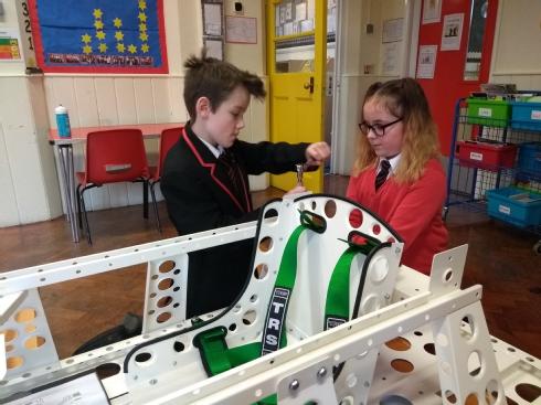 Children from St Mary's building the car