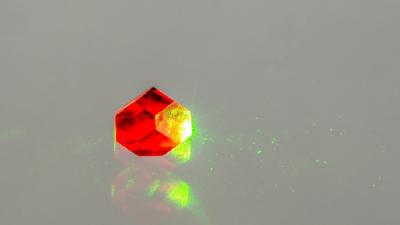 Laser light shining through Element Six’s NV diamond. Copyright of Element Six