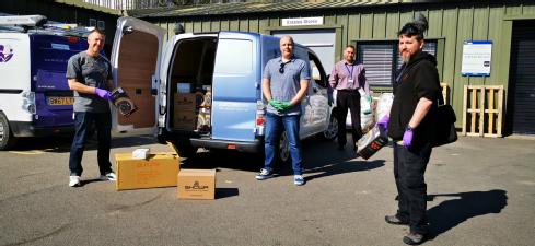 Left to right University of Warwick Chemistry stores manager Steve Dawson; Neil Gillespie, Senior Civil Engineering Technician School of Engineering; Alan Warwood Head of Facilities in Estates; & Kevin Murphy Chemistry Core technician with one of the loads of PPE supplies delivered to UCHW