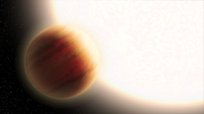  An artist’s concept of a “hot Jupiter” extrasolar planet. Credit: NASA, ESA, and L. Hustak (STScI)