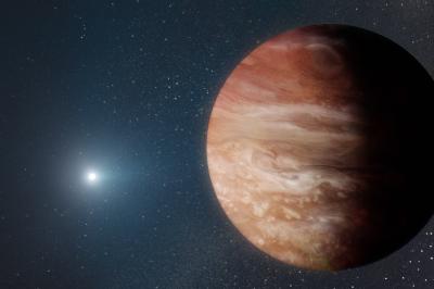 Planets orbiting from a sufficient distance can continue to exist after their star dies. New evidence gathered from a solar system like our own suggests that Jupiter and Saturn might survive the Sun’s red giant phase — when it burns the last of its nuclear fuel and collapses some 5 billion years from now. Credit: W. M. Keck Observatory/Adam Makarenko