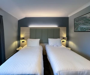 En-suitetwin bedroom at Scarman Twin bedroom with two single beds and en-suite