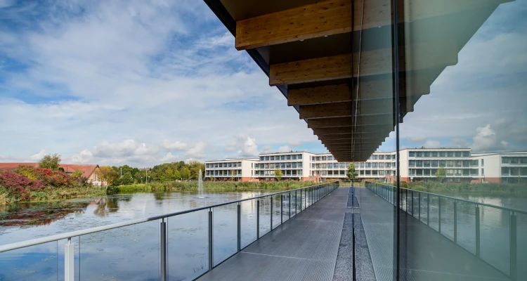 Overlooking the lake on a terrace at the slate building