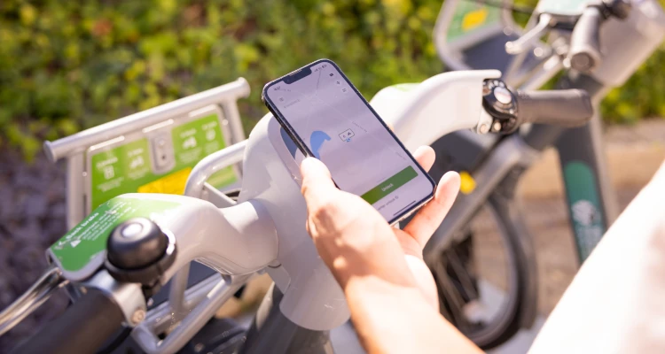 Person using an app for an electric bike