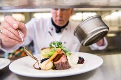 Delicious food being prepared by chef