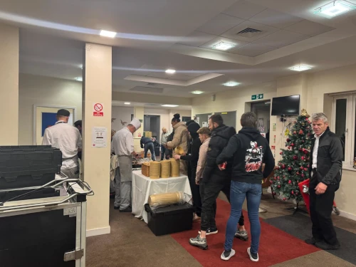 People queue for a meal