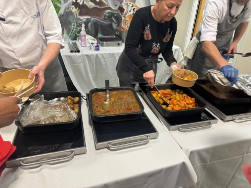 A woman serves some food