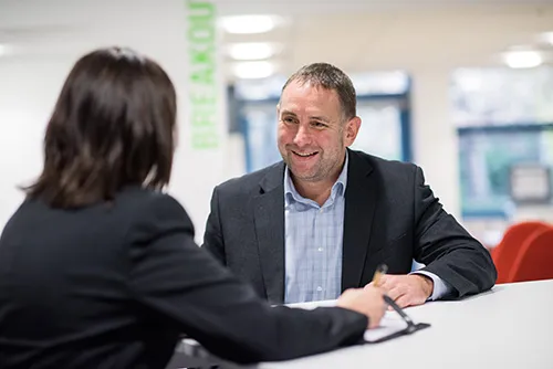 Staff listening to client