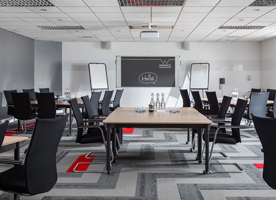 Scarman large meeting room A picture of a larger meeting space with multiple tables
