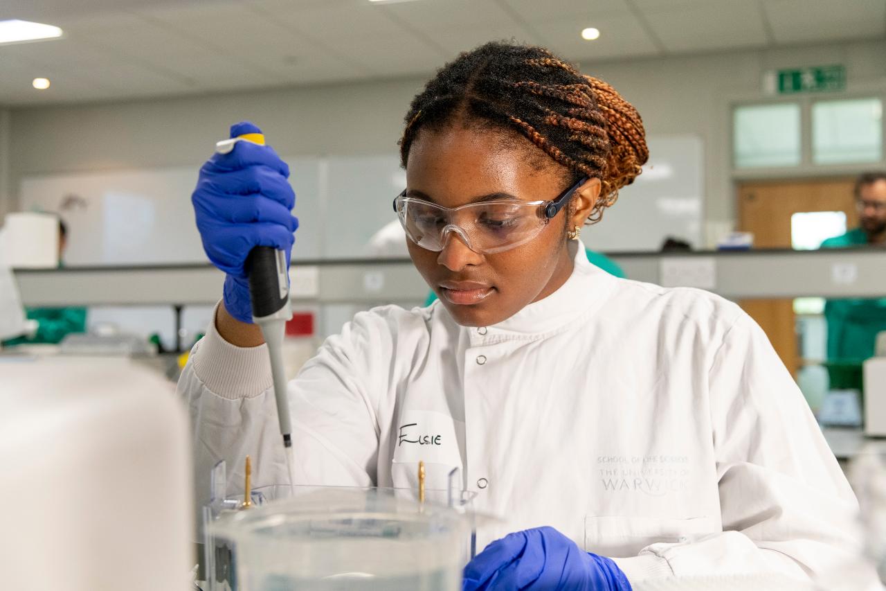 Student pipetting