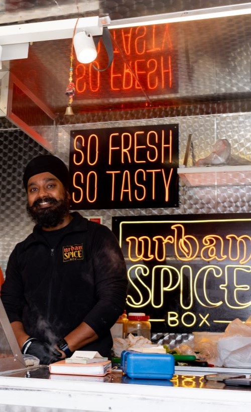 Ubran Spice Box Van with a man standing behind the counter
