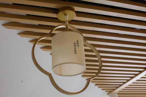 Hanging lampshade with Chinese writing on it