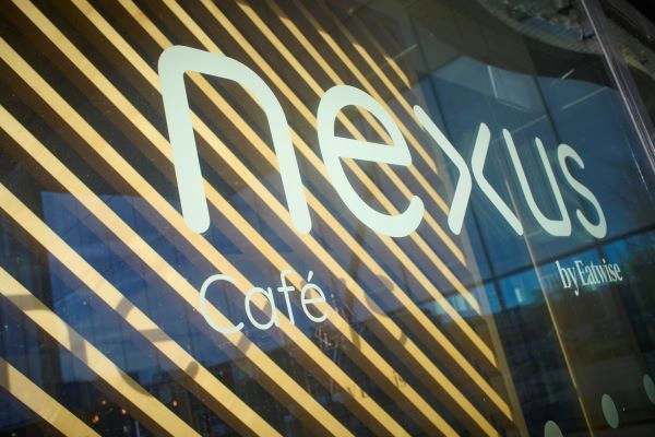 A salad bowl, apple and canned water