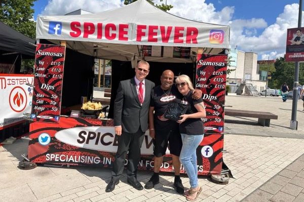 Spice Fever Stall with three people standing in front
