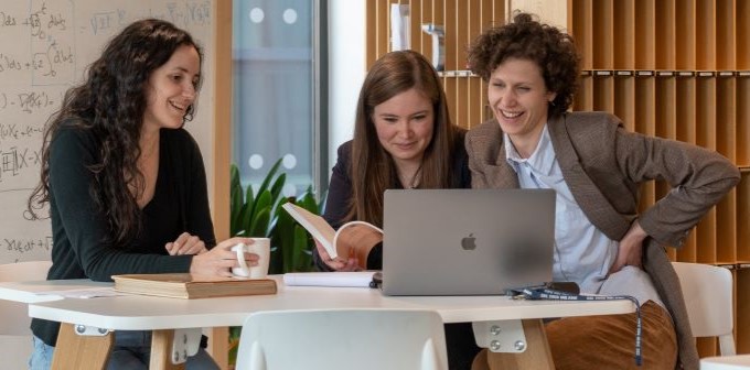 Staff members studying together