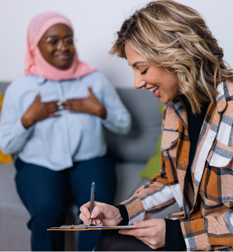 woman interviewing another woman