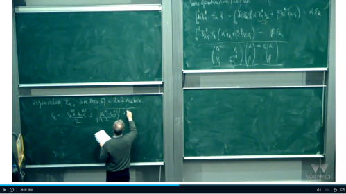 capture of lecturer writing on black board