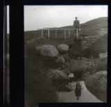 Wayfarer (W.M. Robinson) standing on bridge