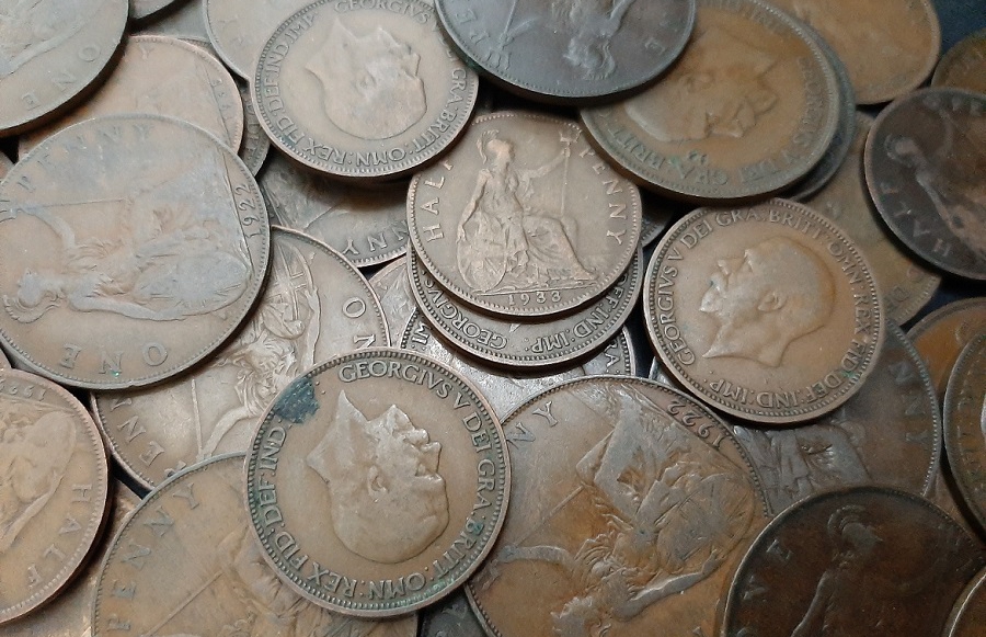 Pile of pre-decimal pennies and half pennies