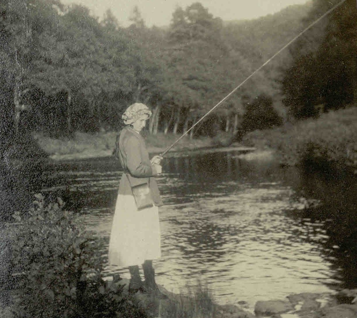Photograph of Eileen Younghusband fishing, 1918
