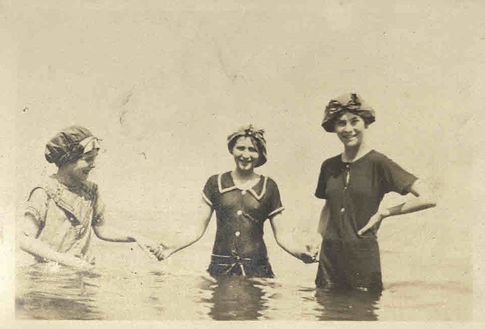 Eileen, Peggy and another person at the seaside