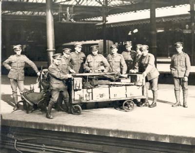 Photograph of soldiers at Newcastle station, armed with a Lewis gun, during the General Strike, 1926