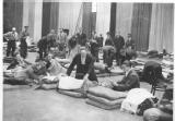 Hundreds of Volunteers are being housed and fed at Earls Court in the Empress and Queens Hall. Photo shows: Volunteers laying down their bed of army biscuits and blankets