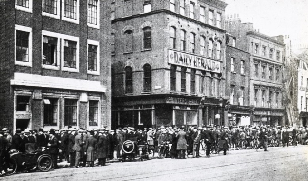 Crowds outside the offices of the Daily Herald newspaper.